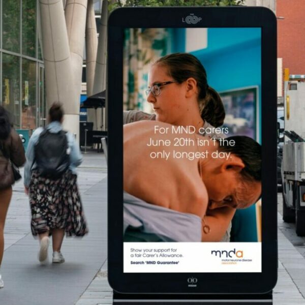 Billboard reading "For MND carers June 20th isn't the only longest day". MND Association billboards reading "The MND Association is using the longest day of the year to highlight that every day is the longest day of the year for hard-working carers.