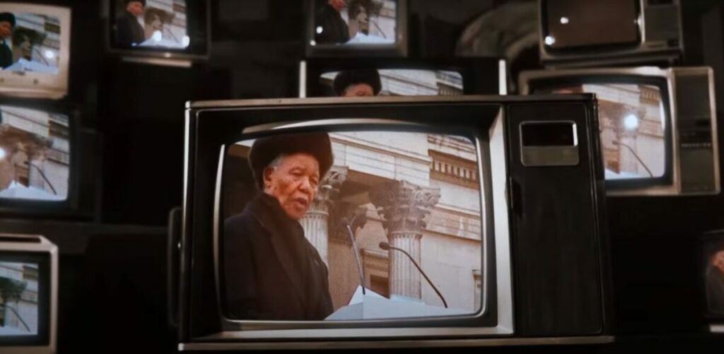 Nelson mandela shown on a TV screen giving his iconic 2005 Maake Poverty History speech. Oxfam honours its 82 years of heritage in its latest TV advert which interrupted Channel 4 News last night, calling on viewers to take action against poverty.