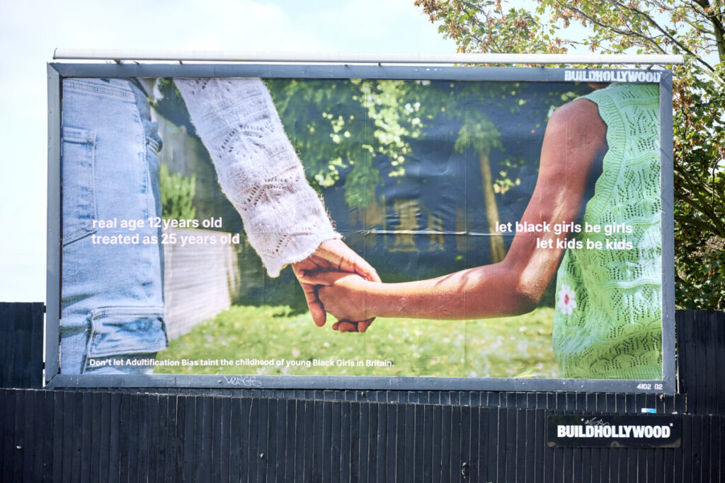 New billlboards by Buildhollywood and Getty images calls on society to "Let Black girls be girls" and highlights the impact of adultification.