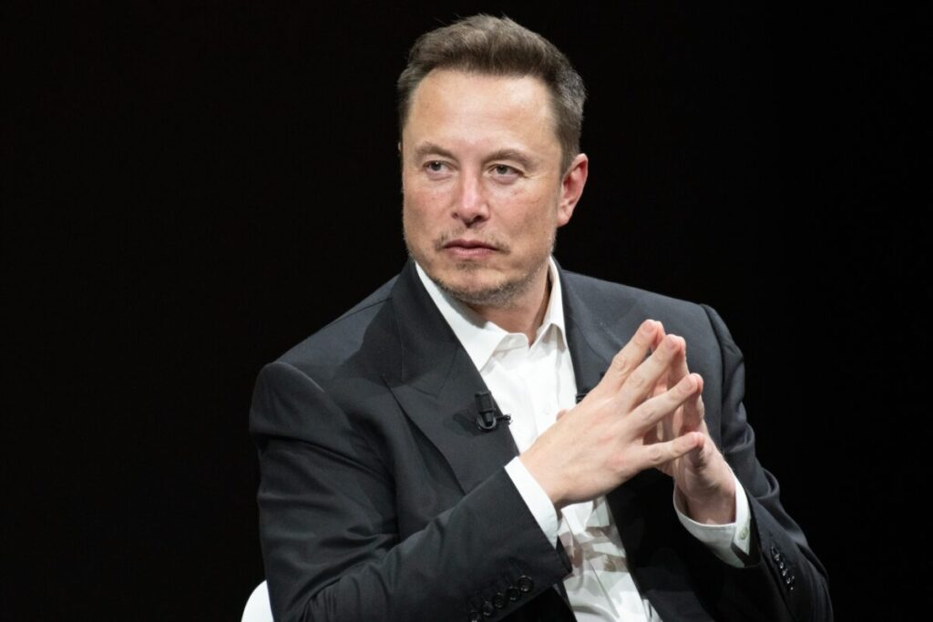 Elon Musk clasps his hands as he prepares for a speech. It seems Musk's ratings are low outside the chattering of media and creative professionals, as four in ten (42%) people who use social media platform X daily have a negative view of it.