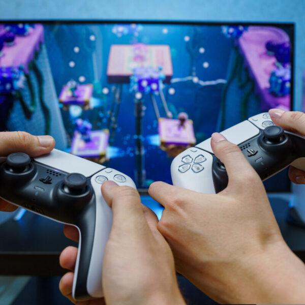 Two people gaming. Consumer goods giant Unilever has reportedly tripled its spending on in-game advertising for brands including Lynx and Dove over the past three years.