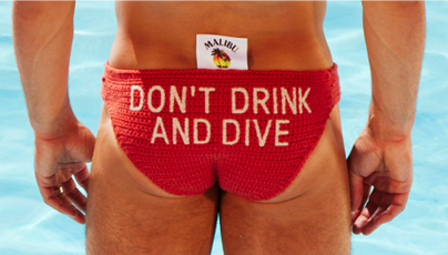 Tom Daley wears a pear of knitted speedo shaped trunks with the text "Don't drink and dive' as part of a tie-up with the Royal Life Saving Society. From the brand's latest Tom Daley spot, to its collaborations with Oatly and Aries Malibu's Craig van Niekerk shares ingredients to the perfect collab.