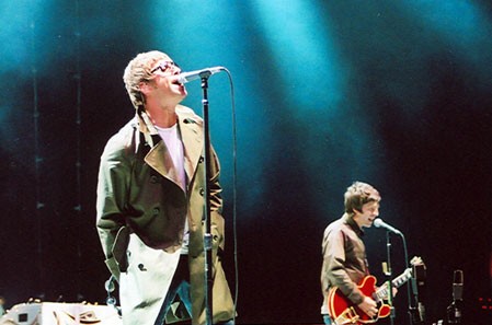 Oasis on stage in San Diego California. The Advertising Standards Authority (ASA) has called on Oasis fans to share their complaints about Ticketmaster's dynamic pricing.