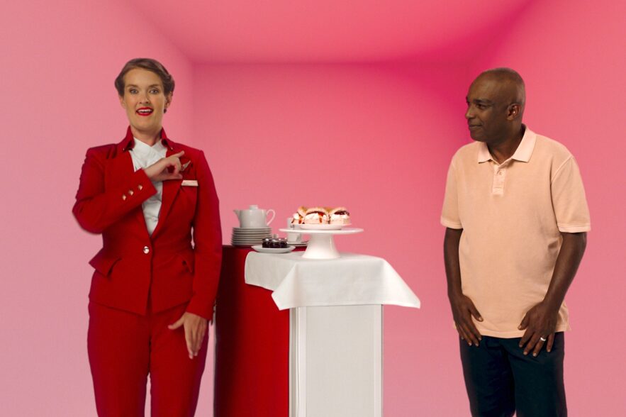 A Virgin Atlantic flight attendant and Channel 4 BSL sign language interpreter chat in BSL and highlight the airline's offering. Virgin Atlantic rolls out BSL campaign for International Week of Deaf People