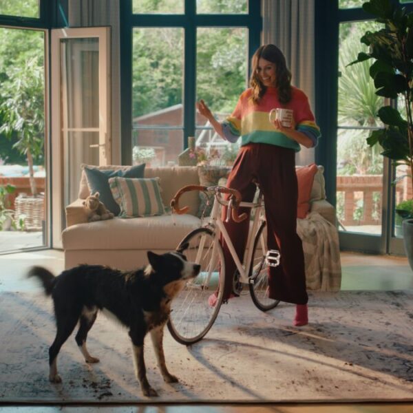 A lady stands with her bicycle and dog on top of a machine-washable rug. Machine-washable rug firm Ruggable has shared a 'Through The Keyhole' inspired spot for its first ever UK television campaign. 