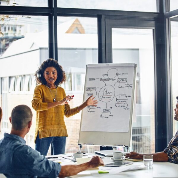 A woman delivers a training course in a meeting room. The Advertising Association and Adwanted UK have created the hub which includes a range of UK-based advertising development opportunities.