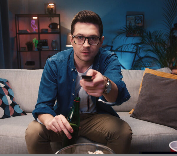 A steep downturn in television advertising has been blamed for a £400m drop in UK TV production revenue which has seen programming budgets being slashed.