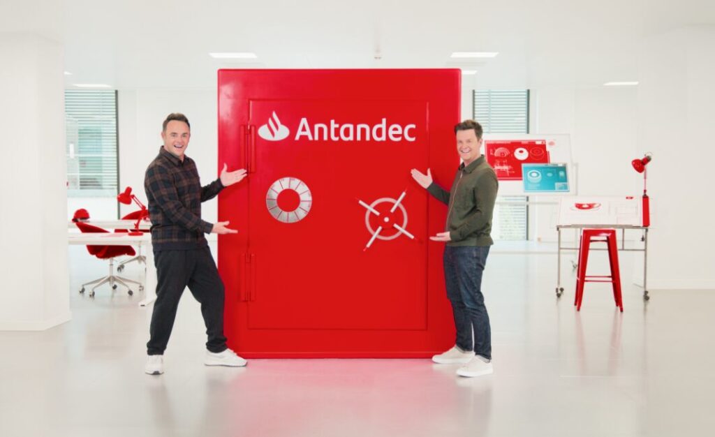 Ant and Dec stand beside a bright red Antanddec safe. Santander sheds light on its free online learning platform Santander Open Academy in its latest spot starring comedic duo Ant and Dec.