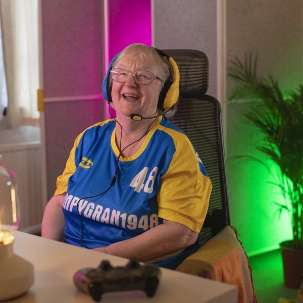 Gaming-mad grandmother Cath Bowie sits in a gamers chair dressed in Ikea items to show off its new collection. Ikea has enlisted a 76-year-old gaming grandmother from Scotland to be the face of its new gamer-focused collection.
