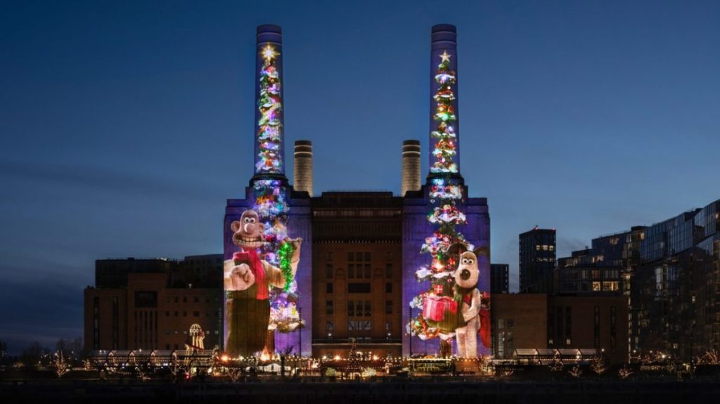 Wallace & Gromit are bringing festive cheer to Battersea Power Station this Christmas with giant-sized projections lighting up the station.