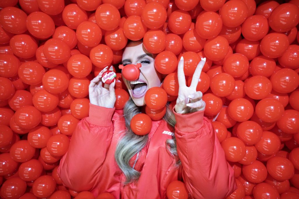Babybel has partnered with Comic Relief and TV personality Chloe Burrows for a new charity-focused campaign ahead of Red Nose Day 2025.
