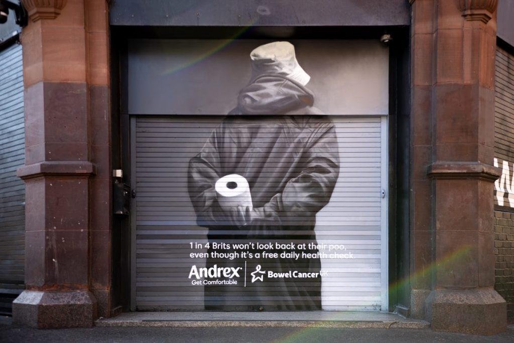 Andrex has partnered with Global Street Art and Bowel Cancer UK to mark Oasis' homecoming reunion with a "poo-tracking" mural