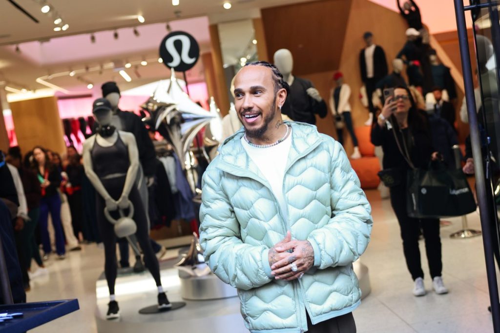 Lululemon ambassador Lewis Hamilton made an unannounced appearance at the brand's Regent Street store on Sunday (14 December).