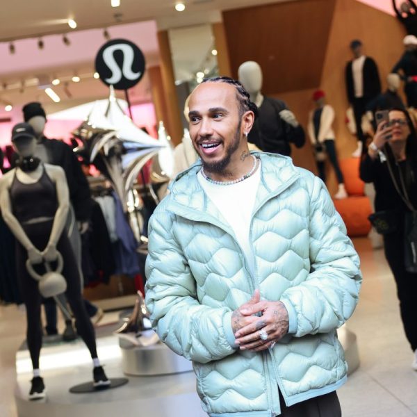 Lululemon ambassador Lewis Hamilton made an unannounced appearance at the brand's Regent Street store on Sunday (14 December).